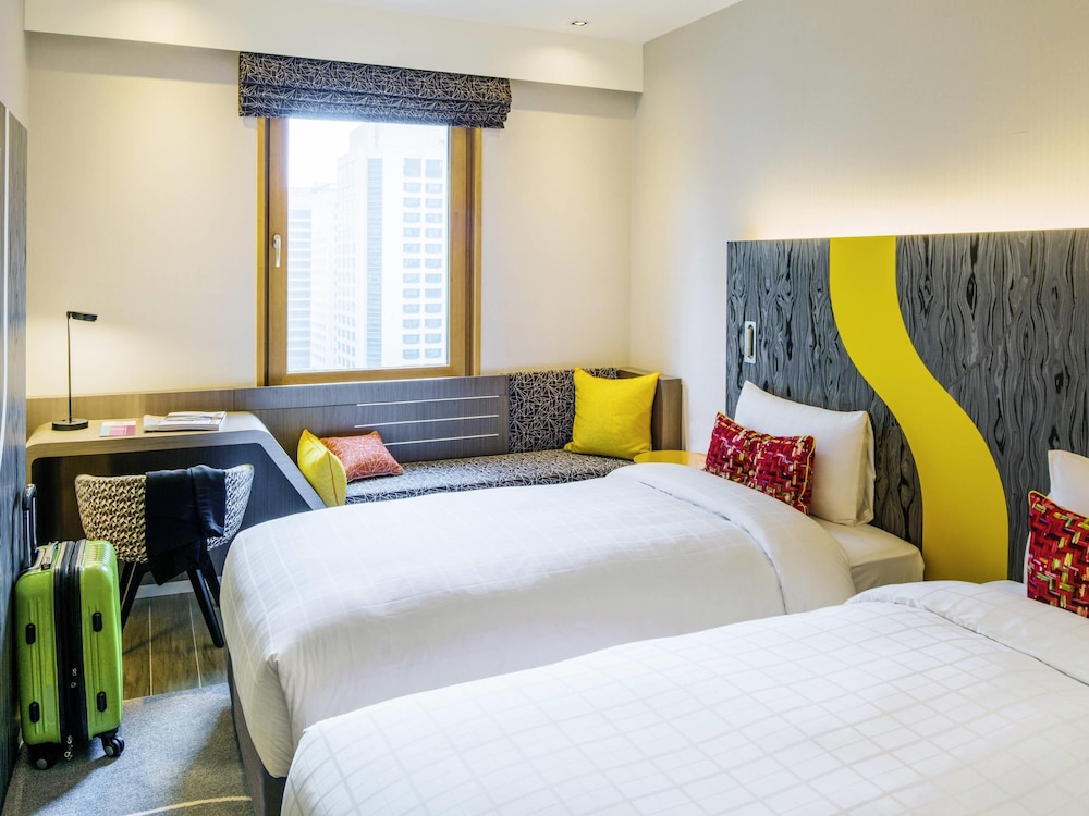 Habitación Deluxe con 2 camas individuales del hotel Ibis Styles Ambassador Seoul Gangnam. Foto 1