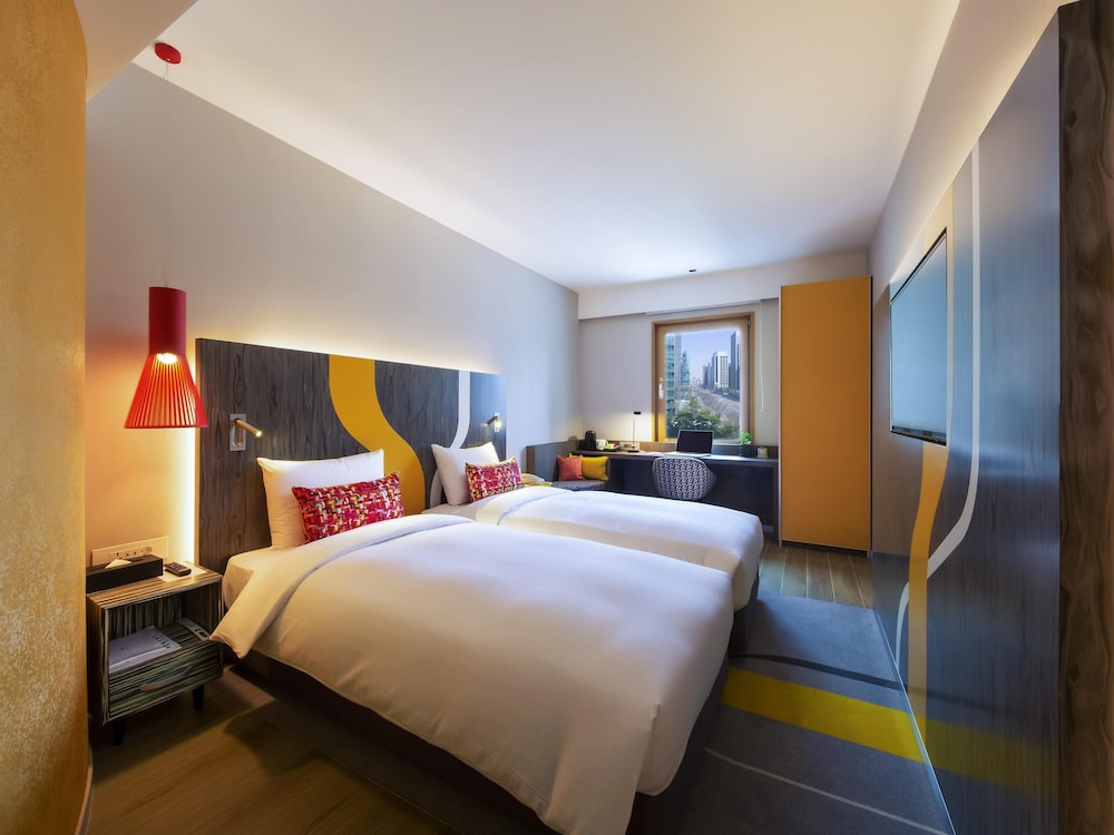 Habitación Deluxe con 2 camas individuales del hotel Ibis Styles Ambassador Seoul Gangnam. Foto 2