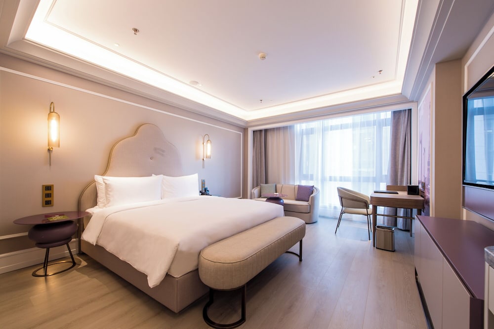 Privilege, Habitación Business, 1 cama de matrimonio grande del hotel Mercure Changchun Hengxing. Foto 3
