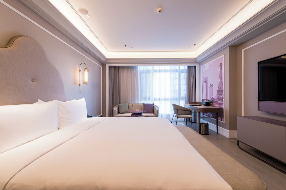 Privilege, Habitación Business, 1 cama de matrimonio grande del hotel Mercure Changchun Hengxing. Foto 5