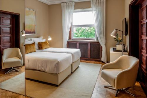 Habitación Doble Deluxe del hotel Luzeiros Suites. Foto 2