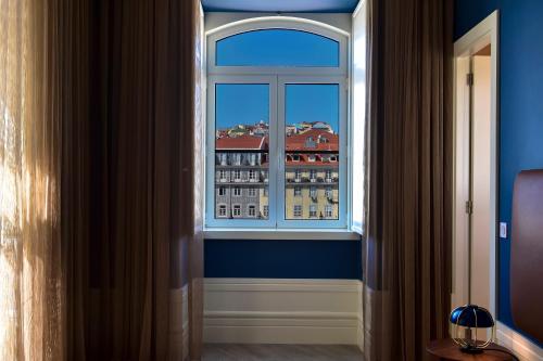 Habitación Doble con vistas a la plaza de Figueira del hotel My Story Figueira. Foto 1