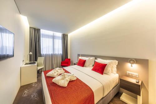 Habitación Clásica Vistas a la Ciudad del hotel Melia Maputo Sky. Foto 1