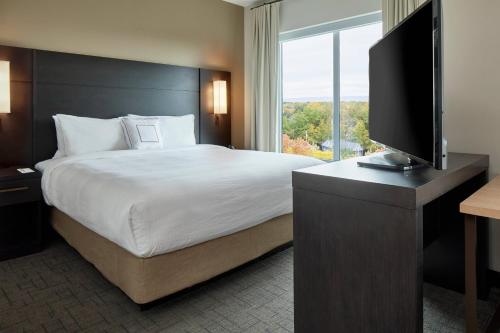 Estudio con 1 cama extragrande, sofá cama y bañera adaptada - Adaptado para personas con movilidad reducida del hotel Residence Inn by Marriott Albany Airport. Foto 2