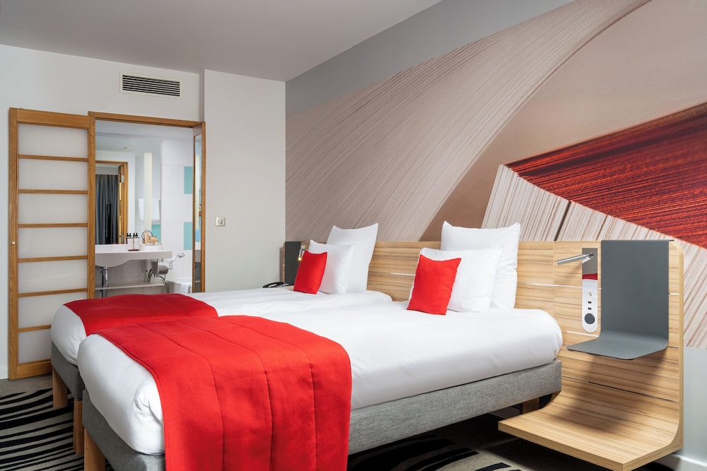 Habitación superior, 2 camas individuales del hotel Novotel Bucharest City Centre. Foto 1