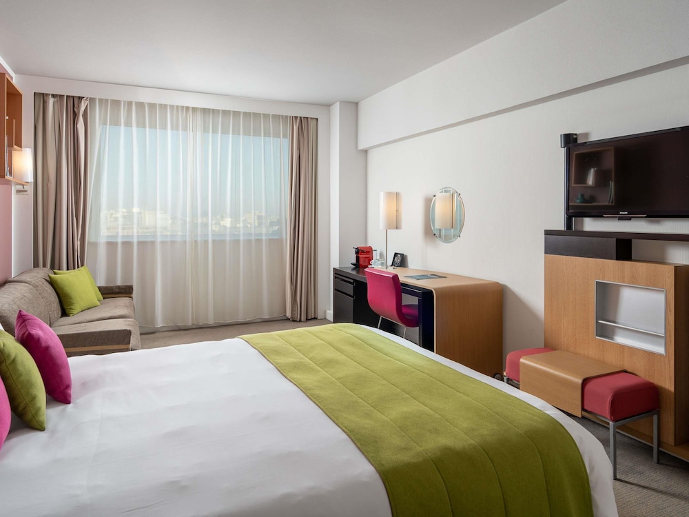 Habitación doble 1 Cama queen Vista ciudad Business Sofá Cama incluido Normal del hotel Novotel Bucharest City Centre. Foto 5