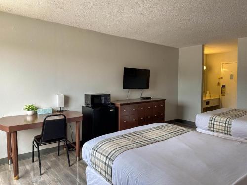 Habitación Cuádruple Deluxe para no fumadores del hotel 6 Rochester