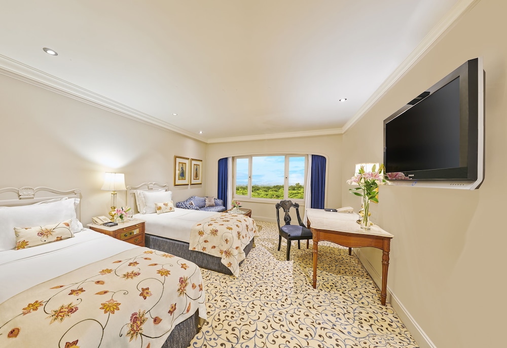 Habitación Superior con dos camas individuales y vistas al Enclave Diplomático del hotel Taj Palace, New Delhi