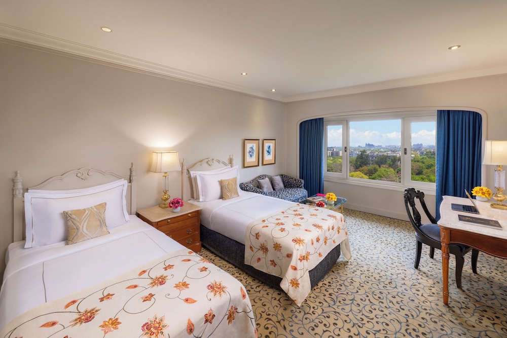 Habitación Superior con dos camas individuales y vistas al Enclave Diplomático del hotel Taj Palace, New Delhi. Foto 4