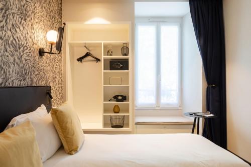 Habitación Doble del hotel Prince Albert Gare de Lyon. Foto 13