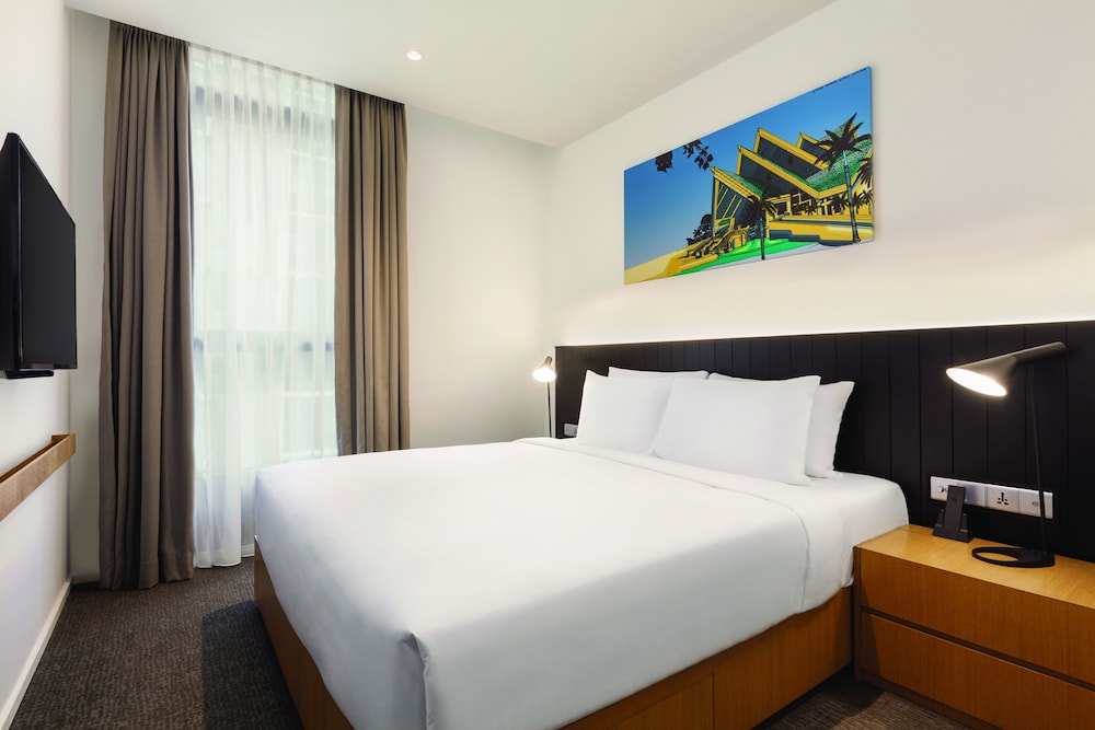 Suite de un dormitorio con cama king (con sofá cama) del hotel Hyatt House Kuala Lumpur, Mont Kiara. Foto 2