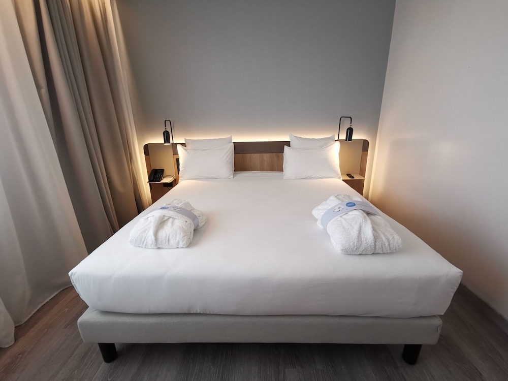 Habitación Ejecutiva del hotel Novotel Parma Centro. Foto 3