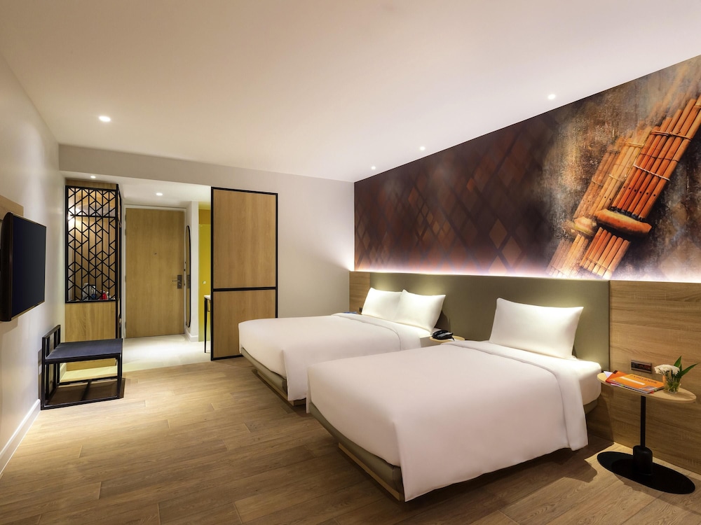 Habitación Triple con 1 cama Queen y 1 cama individual del hotel ibis Styles Bangkok Ratchada