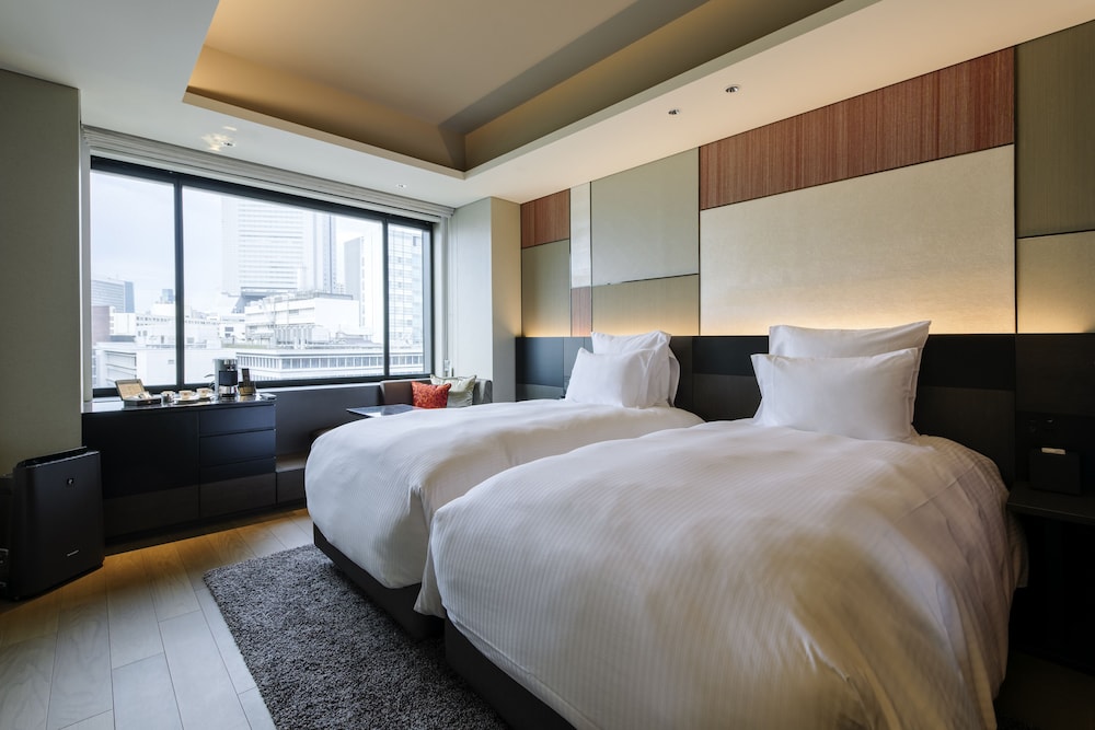 HABITACIÓN EXECUTIVE SUPERIOR, Acceso al Lounge, 2 camas individuales del hotel Pullman Tokyo Tamachi. Foto 2