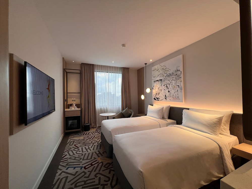 Habitación superior con 2 camas individuales del hotel Mercure Kuala Lumpur Glenmarie. Foto 1