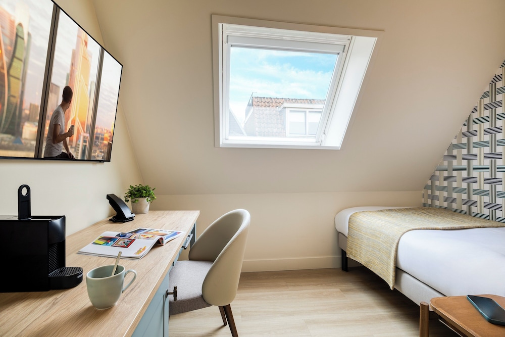 Habitación Estandar del hotel Citadines Canal Amsterdam. Foto 1