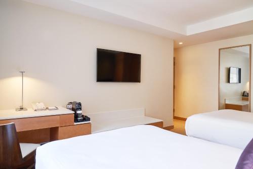 Habitación Doble Deluxe del hotel Concorde New York. Foto 2