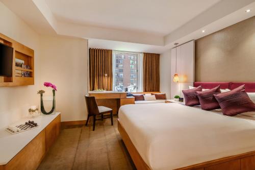 Habitación Doble Estándar del hotel Concorde New York. Foto 3