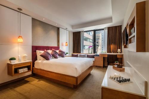 Habitación con cama extragrande - Adaptada para personas de movilidad reducida del hotel Concorde New York. Foto 1