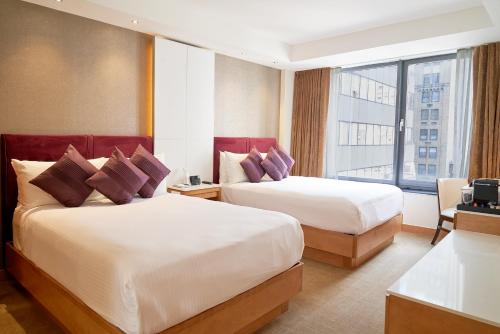 Habitación Doble Deluxe del hotel Concorde New York. Foto 4