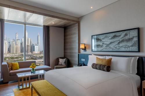 Habitación Doble Taj Club - cama doble extragrande del hotel Taj Jumeirah Lakes Towers