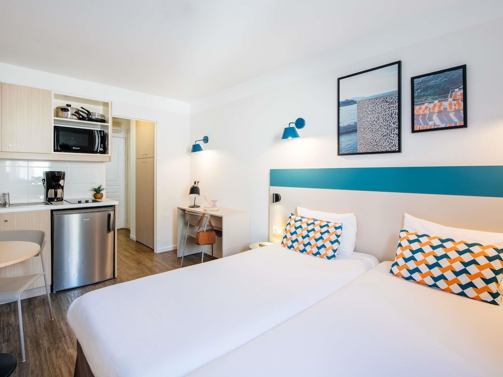 Estudio con camas individuales del hotel Aparthotel Adagio Access Marseille Prado Périer. Foto 3