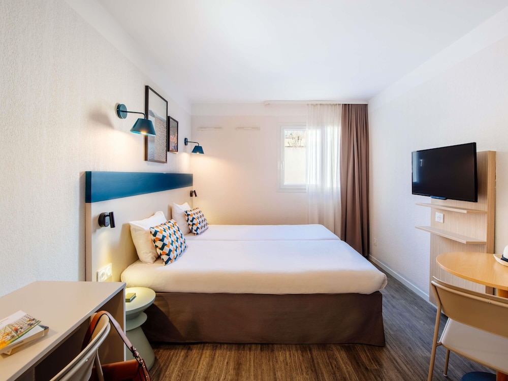 Estudio con camas individuales del hotel Aparthotel Adagio Access Marseille Prado Périer. Foto 5