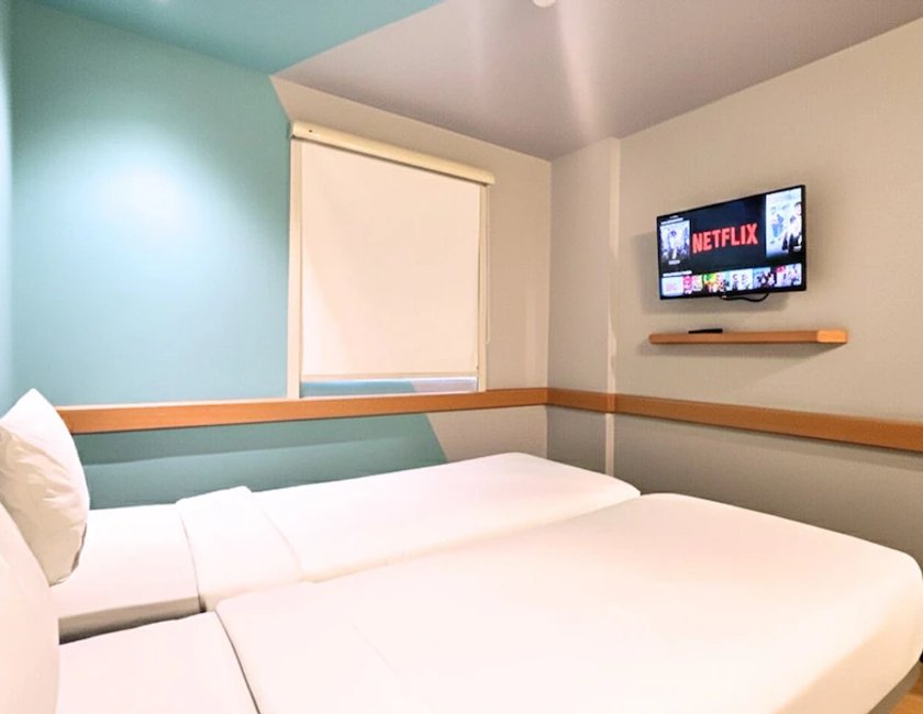 Habitación estándar Vista ciudad 2 Camas individuales del hotel ibis budget Jakarta Airport. Foto 1