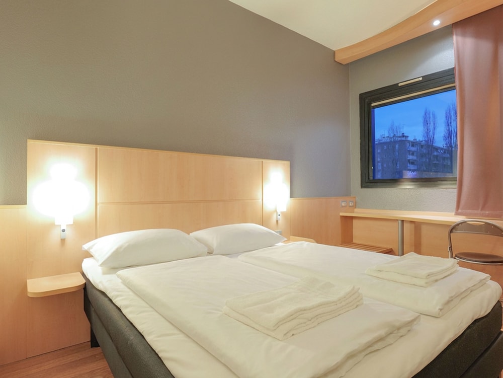 Habitación con 2 camas individuales del hotel a&o Milano Ca Granda