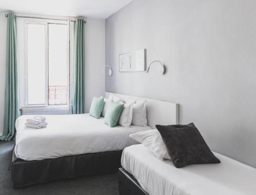 Habitación Triple del hotel Porte De Versailles. Foto 1