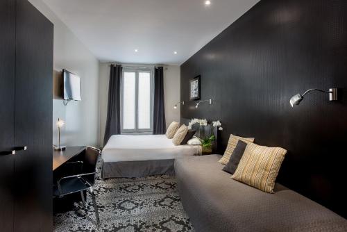 Habitación Triple del hotel Porte De Versailles. Foto 3