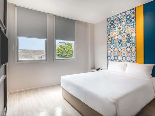 Suite Familiar con 1 Cama Doble y Cama de Dos Pisos del hotel Ibis Styles Phuket City. Foto 1