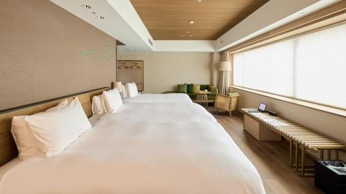 Habitación Doble Deluxe Grand - 2 camas individuales del hotel Good Nature Hotel Kyoto. Foto 1