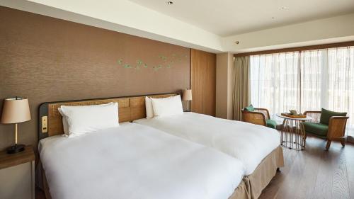 Habitación doble Lujo con salón Esquinera 2 Camas individuales del hotel Good Nature Hotel Kyoto. Foto 1