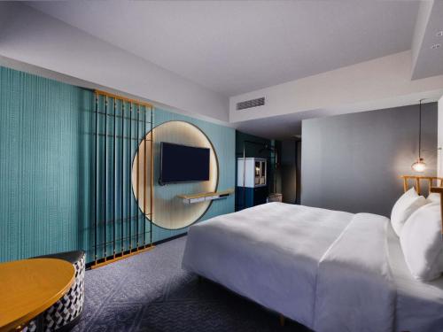Habitación Superior con 2 camas y bañera del hotel Mercure Kyoto Station. Foto 5