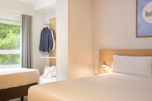 Habitación Triple del hotel Rooms Ciencias. Foto 1