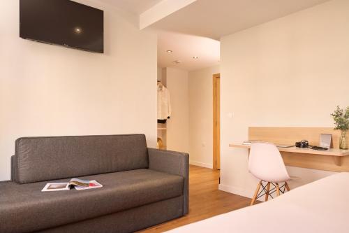Habitación Triple del hotel Rooms Ciencias. Foto 5
