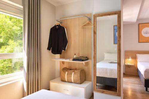 Habitación Triple del hotel Rooms Ciencias. Foto 14