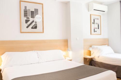 Habitación Triple del hotel Rooms Ciencias. Foto 17