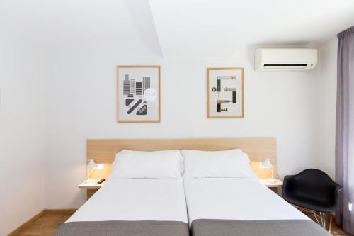 Habitación Cuádruple del hotel Rooms Ciencias. Foto 12