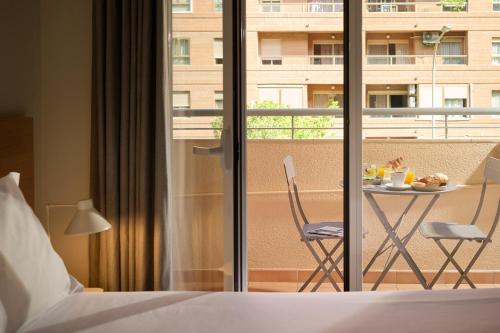 Habitación Cuádruple con balcón del hotel Rooms Ciencias. Foto 11