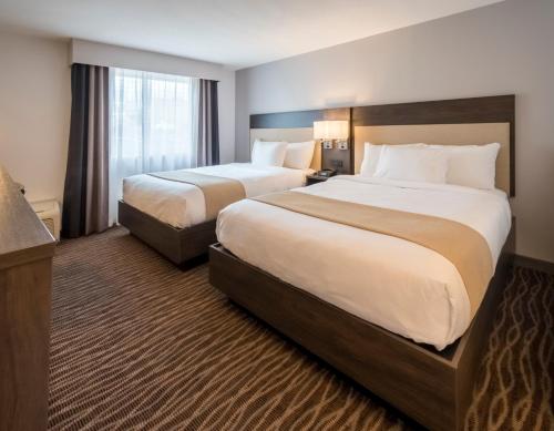 Habitación Queen con dos camas Queen - No fumadores del hotel Country Inn and Suites by Radisson, Rochester-Pittsford/Brighton, NY. Foto 4