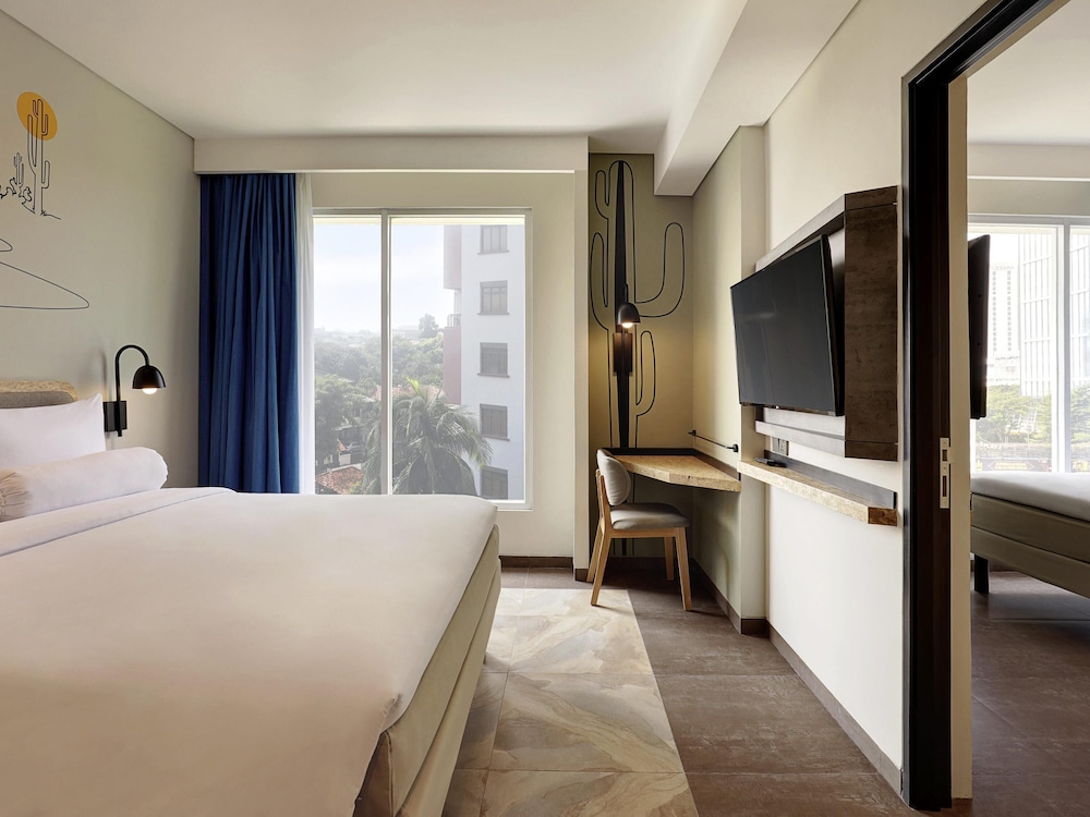 Habitación Familiar con 2 Habitaciones Conectadas del hotel Ibis Styles Jakarta Simatupang - Chse Certified. Foto 1