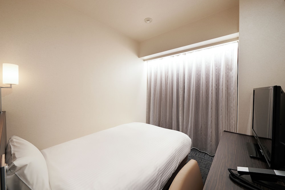 Habitación individual, fumadores (120cm Bed Width) del hotel Sotetsu Fresa Inn Ochanomizu-Jimbocho. Foto 2