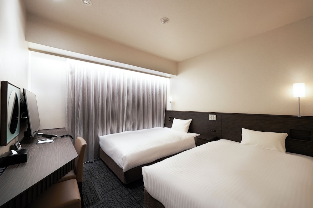 Habitación con 2 camas individuales, fumadores del hotel Sotetsu Fresa Inn Ochanomizu-Jimbocho. Foto 1