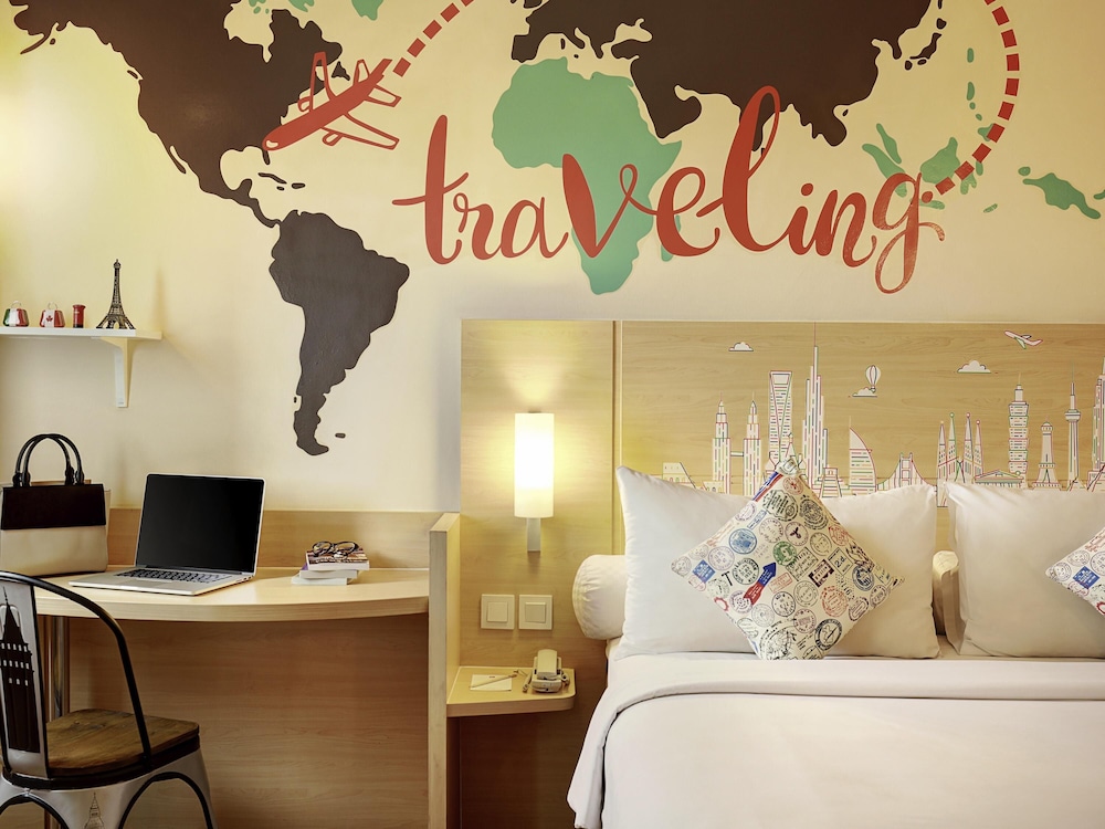 Habitación familiar (Window of the world) del hotel Ibis Jakarta Harmoni. Foto 1