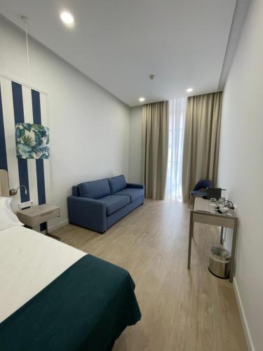 Habitación Triple del hotel Soho Boutique Urban. Foto 16