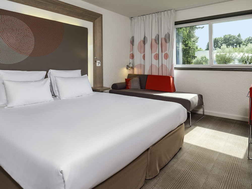 Habitación Clásica con 1 cama doble y 1 sofá - cama individual del hotel Novotel Nantes Carquefou
