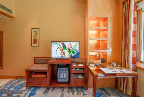Habitación Deluxe del hotel Park Plaza Beijing Wangfujing. Foto 3