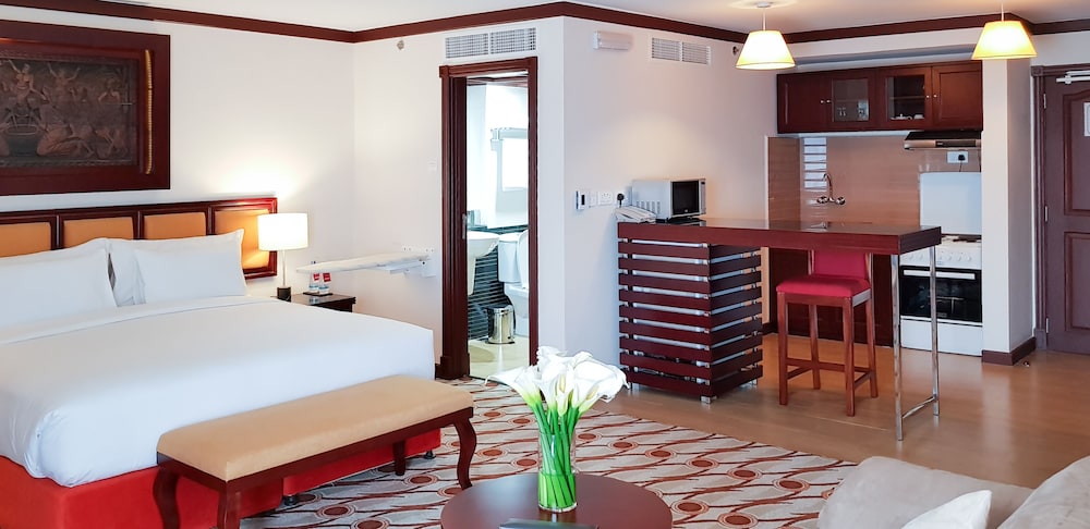 Habitación Deluxe, 1 cama de matrimonio grande del hotel Mövenpick and Residences Nairobi. Foto 1
